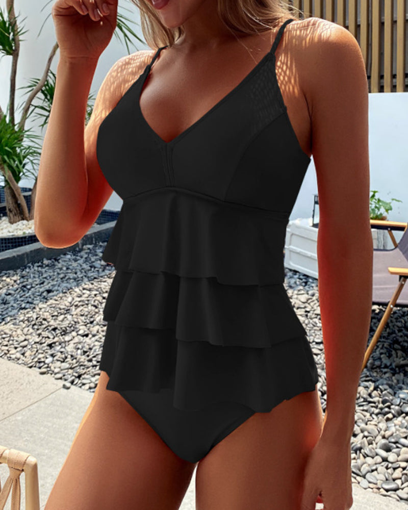 Lia - Solid color swimsuit with trendy ruffles