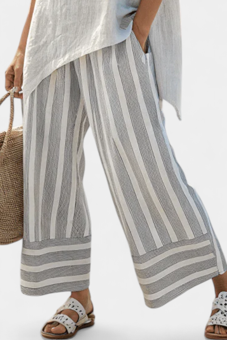 Daisy Set with Asymmetrical T-Shirt and Striped Trousers for a Modern and Elegant Style